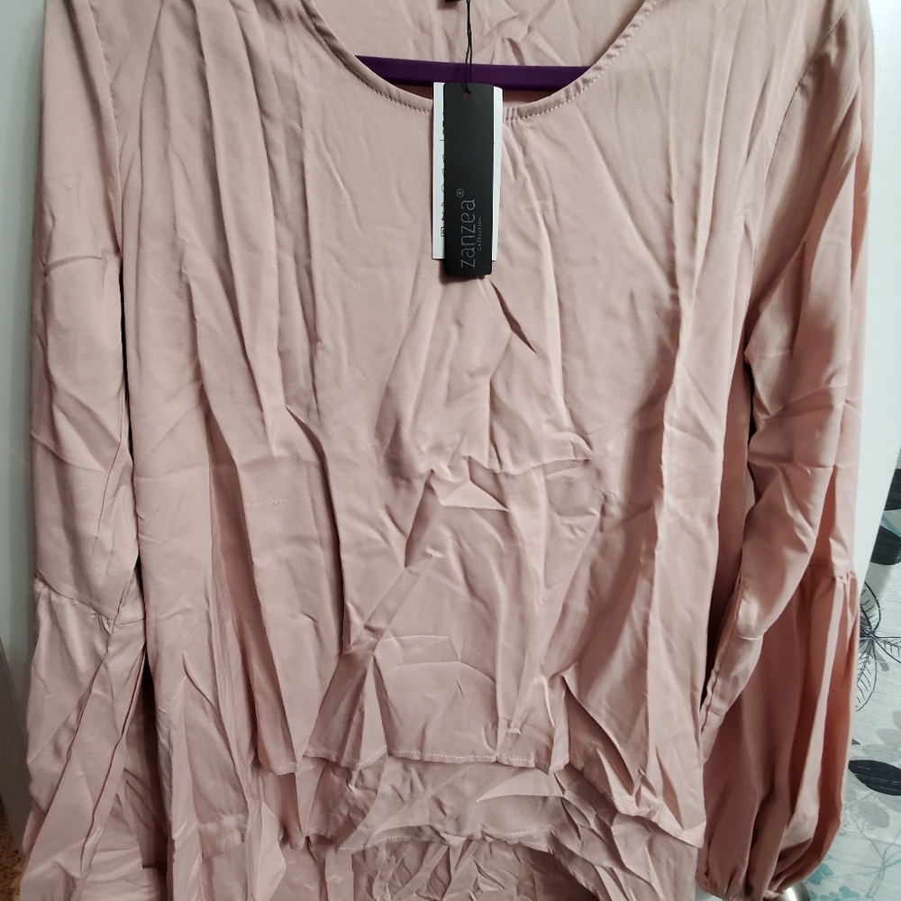 Womans blush high-low blouse
